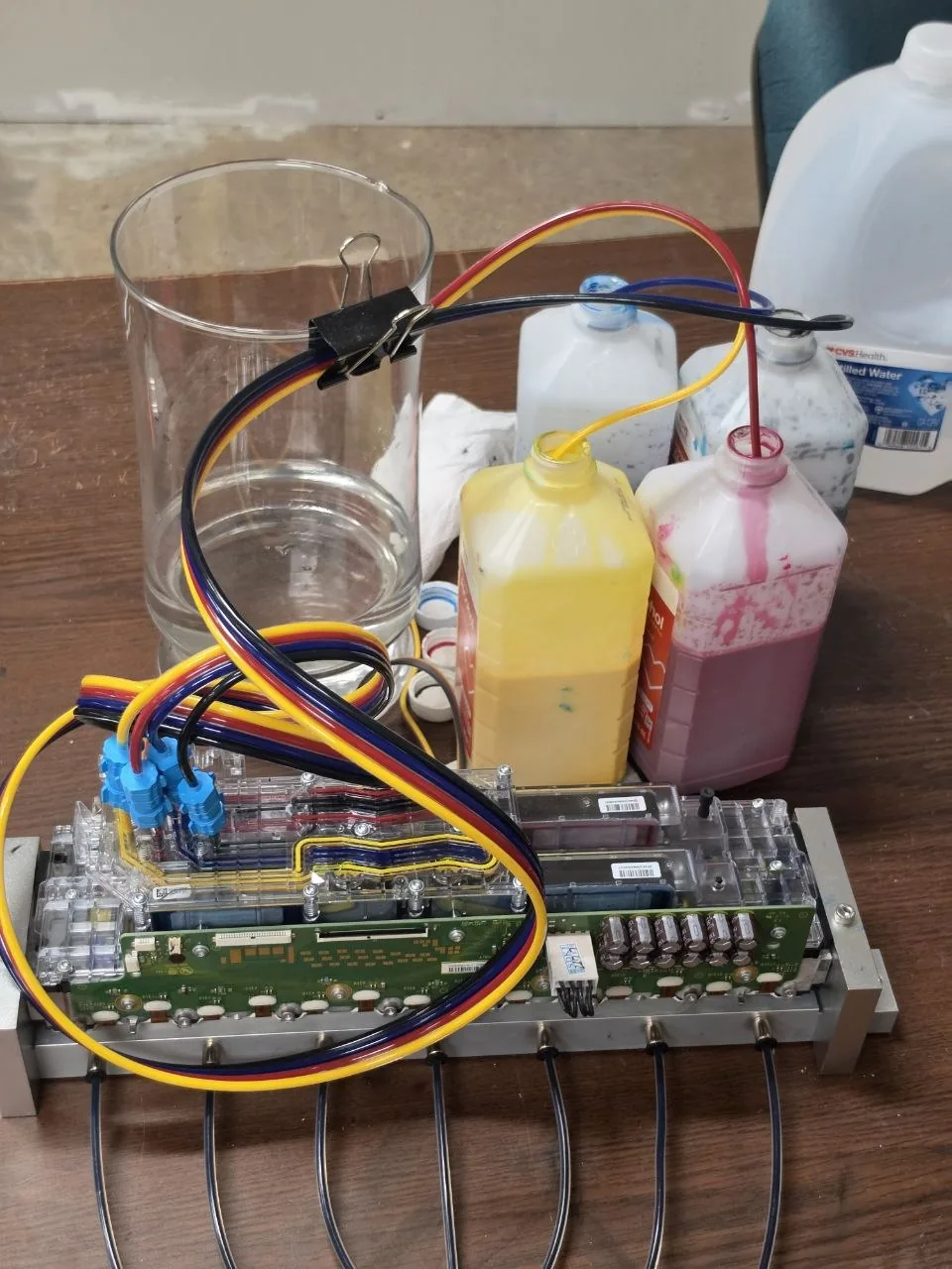 FI-1000 printhead and ink delivery assembly being serviced in the InkBags workshop